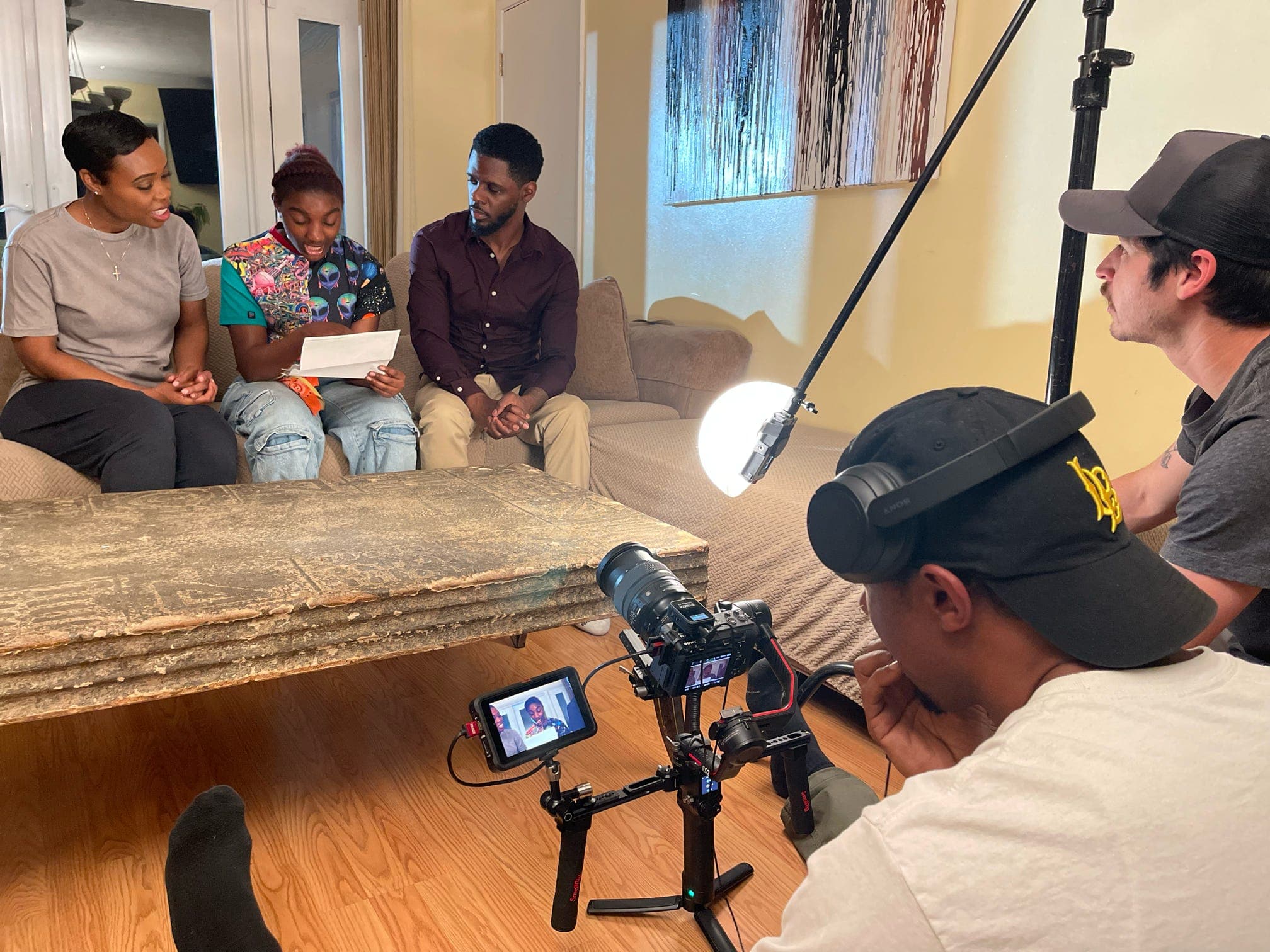 Full crew on set during an interview shoot